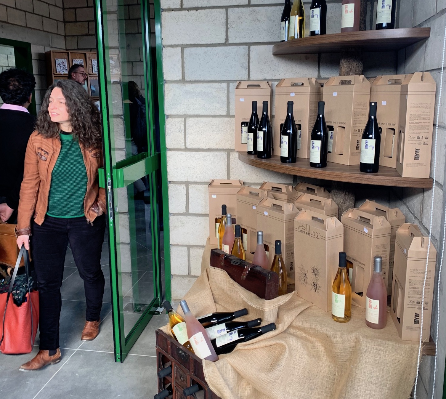 Prof. Elena Isayev enjoying her shopping experience at Souk el Hima, HHIC