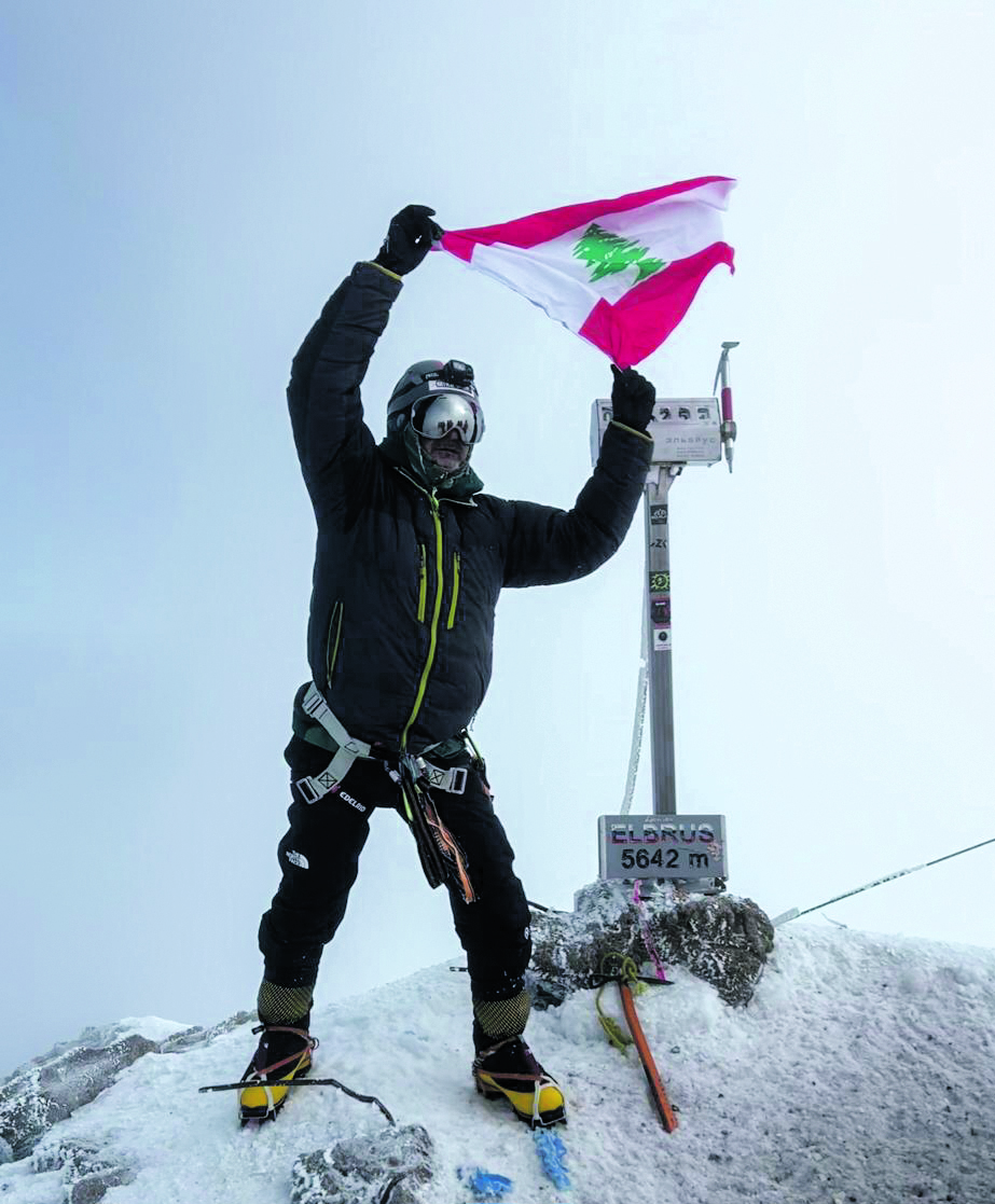 Malaeb raising the Lebanese flag on top of Europe